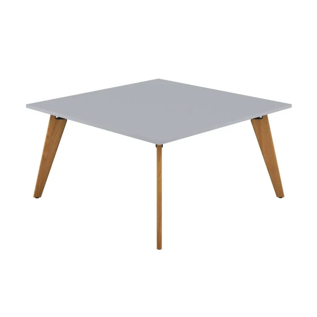 Plateau Square Table with angled wooden legs in a modern meeting room