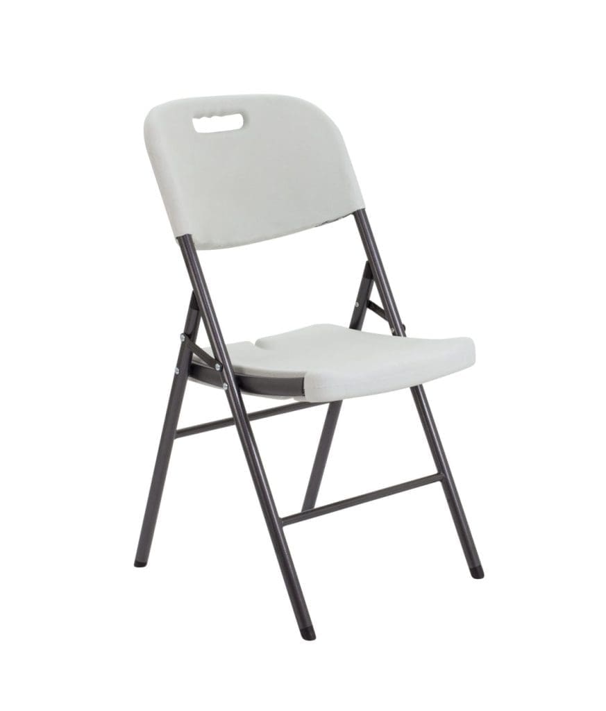 Off-white folding chair with dark grey metal legs and built-in handle, folded and stacked in meeting room