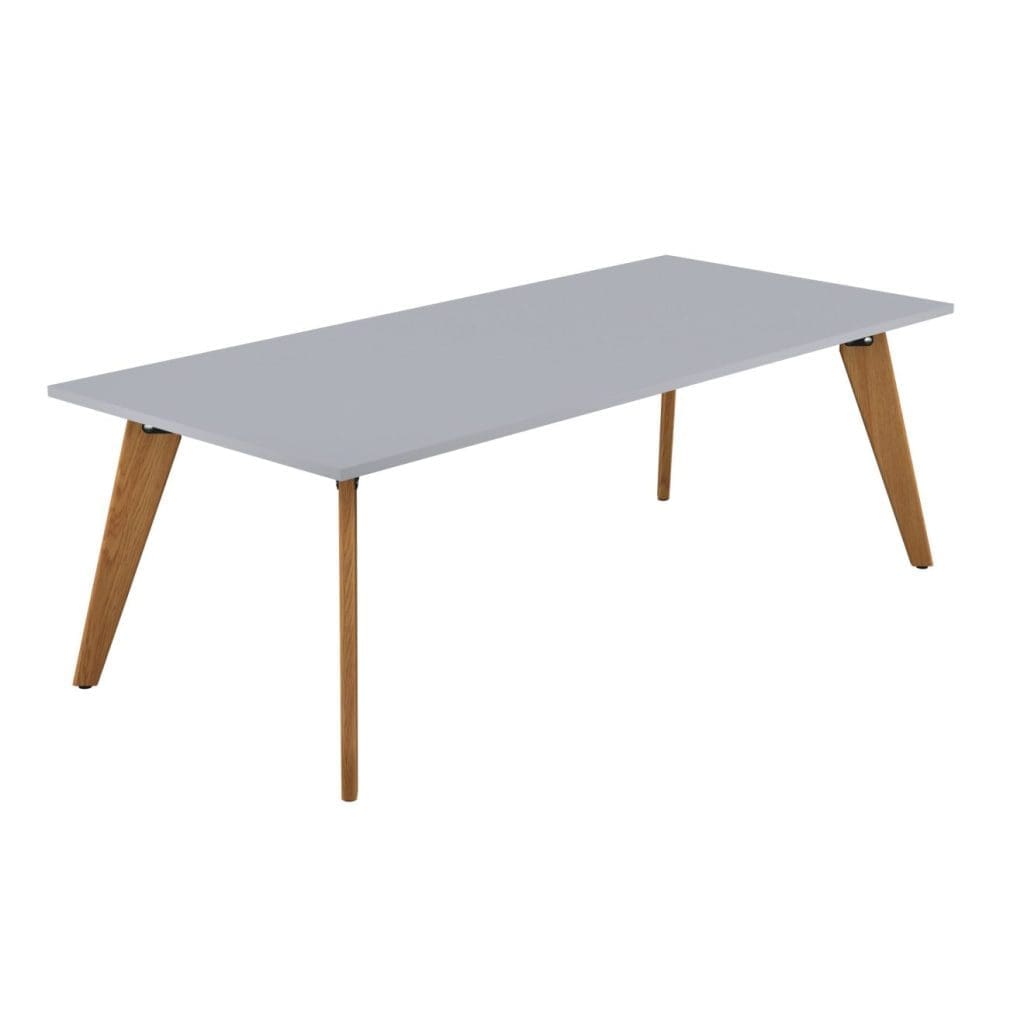 Rectangular Table with wooden legs and modern rectangular top in office setting