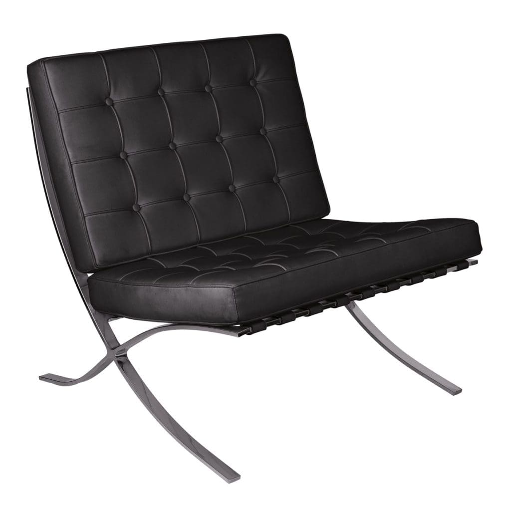 Oversized leather reception chair with buttoned stitching and steel curvaceous legs